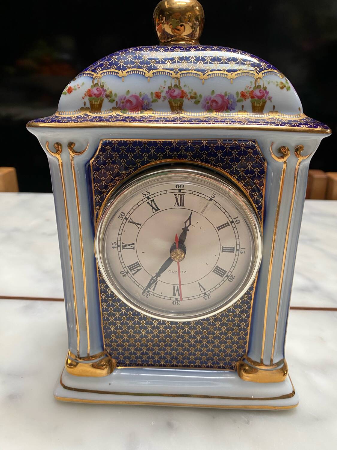English porcelain clock and candle holders