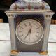 English porcelain clock and candle holders