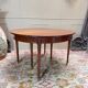 Dining table with a mahogany band in louis xvi style