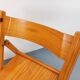 Pair of vintage folding chairs in pine from the 70s and 80s.