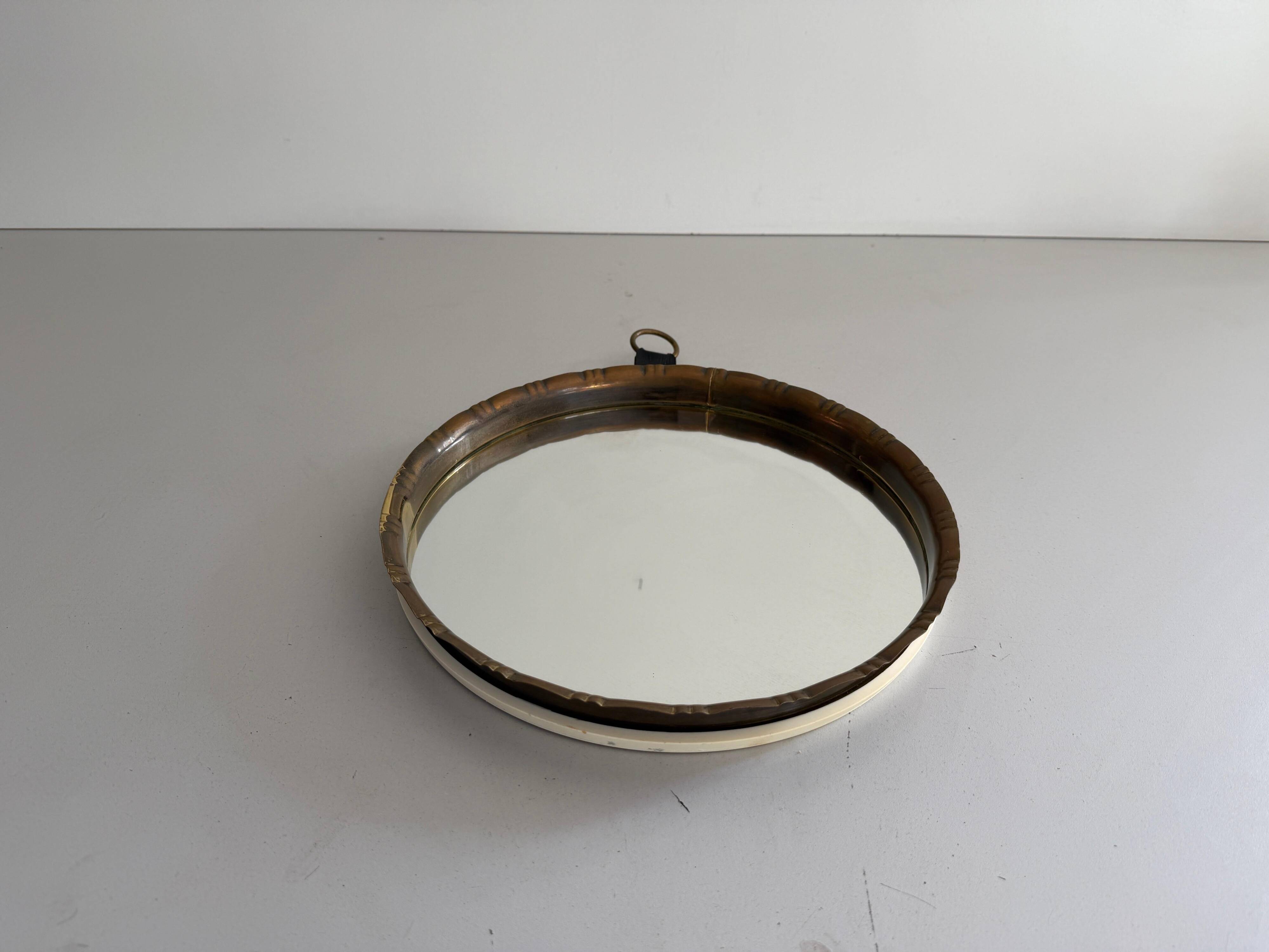 Round wall mirror with brass frame and leather hanger, 1960, Germany