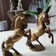 of greenhouse art deco bookends recancing unicorns. solid brass