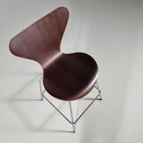 Set of 4 brown oak plywood bar stools by Fritz Hansen Series 7 by Arne Jacobsen.