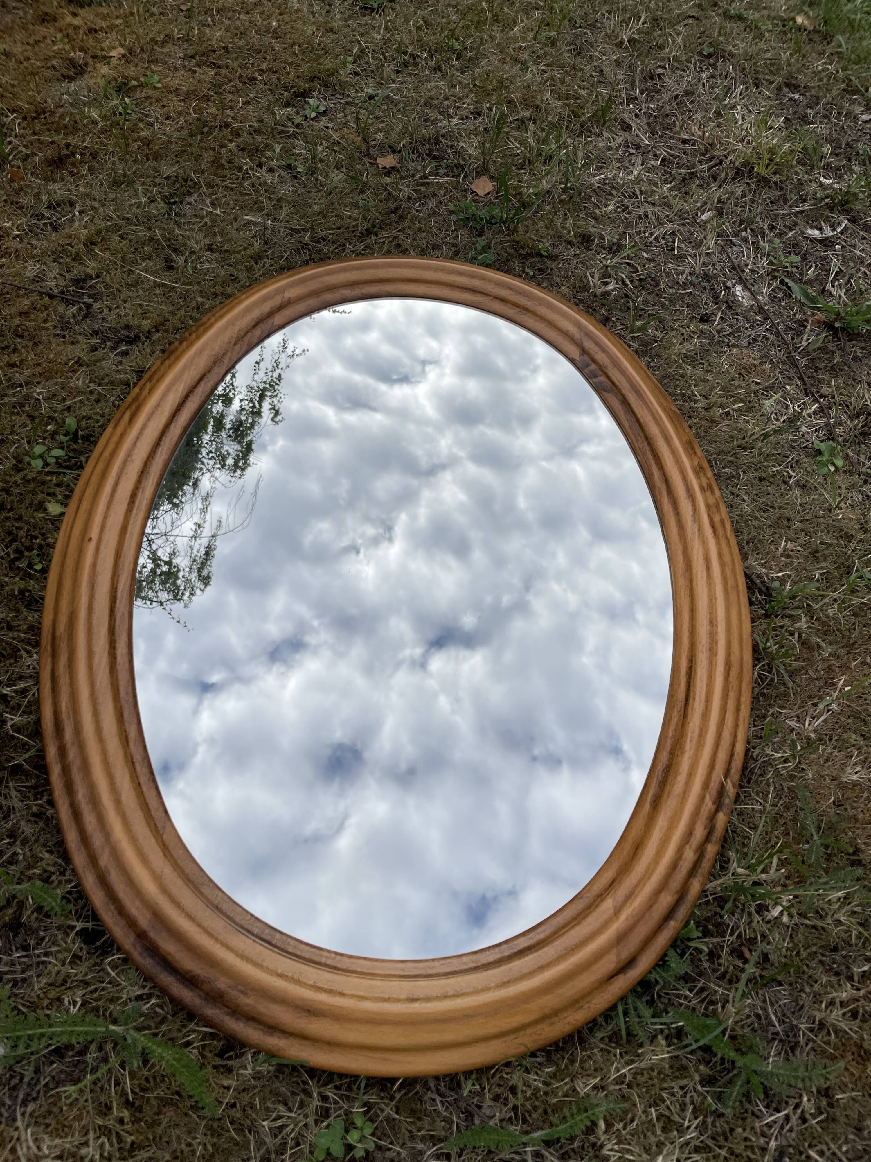Oval wooden mirror 46x72cm