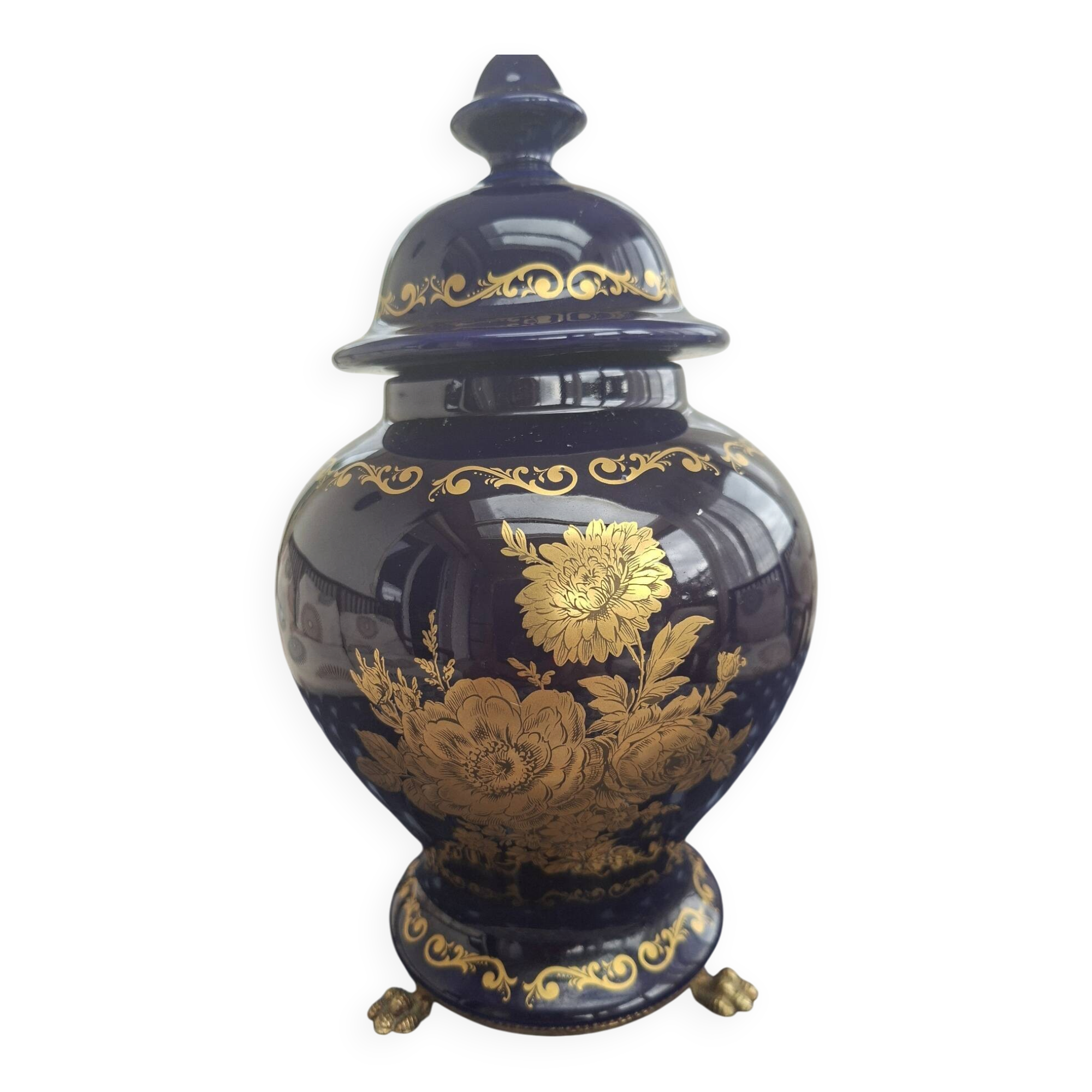 Cobalt blue porcelain bonbonnière with gold decoration on feet.