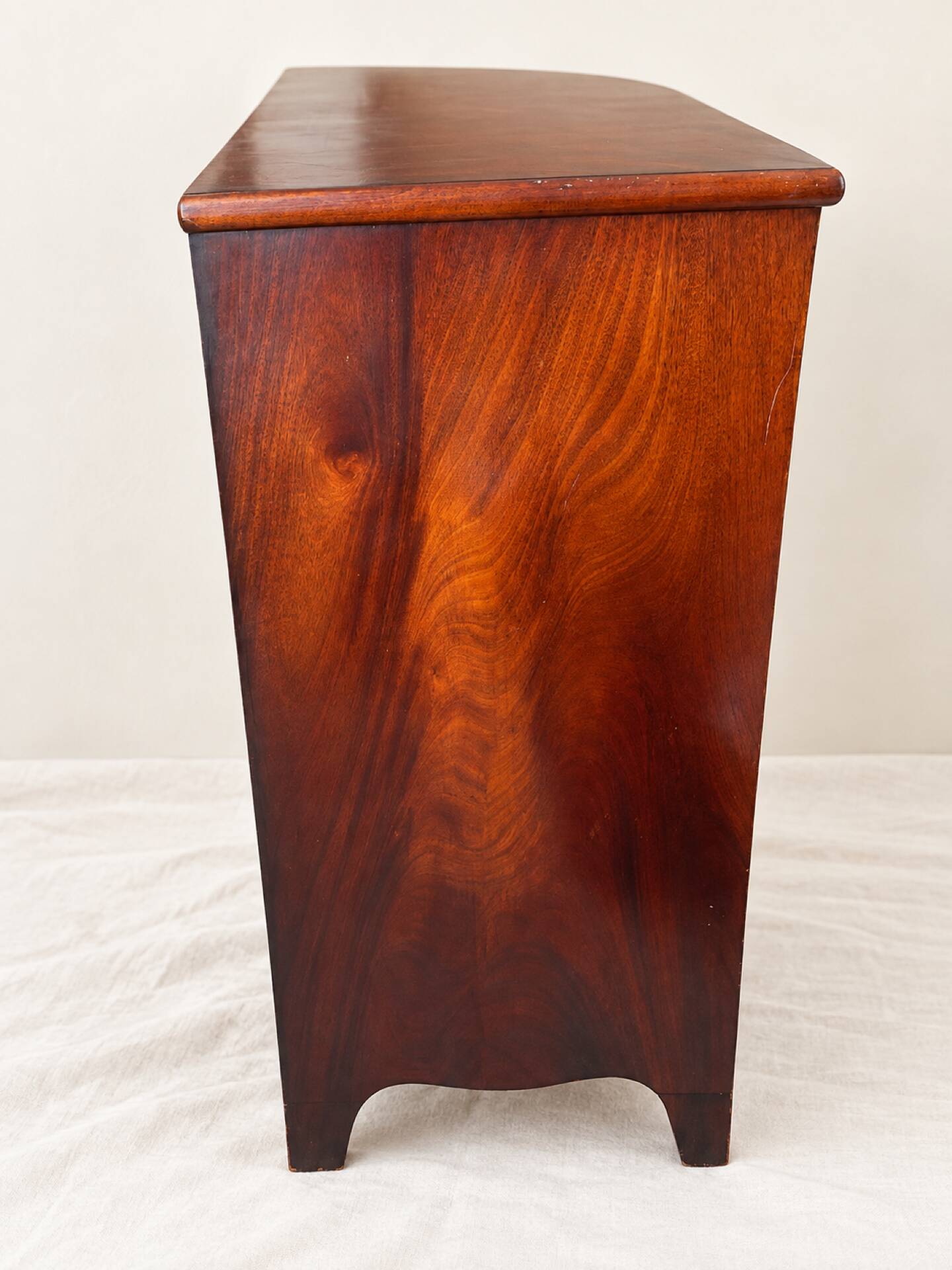 Flame mahogany drop-leaf writing desk, English style.