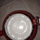 Small red metal teapot