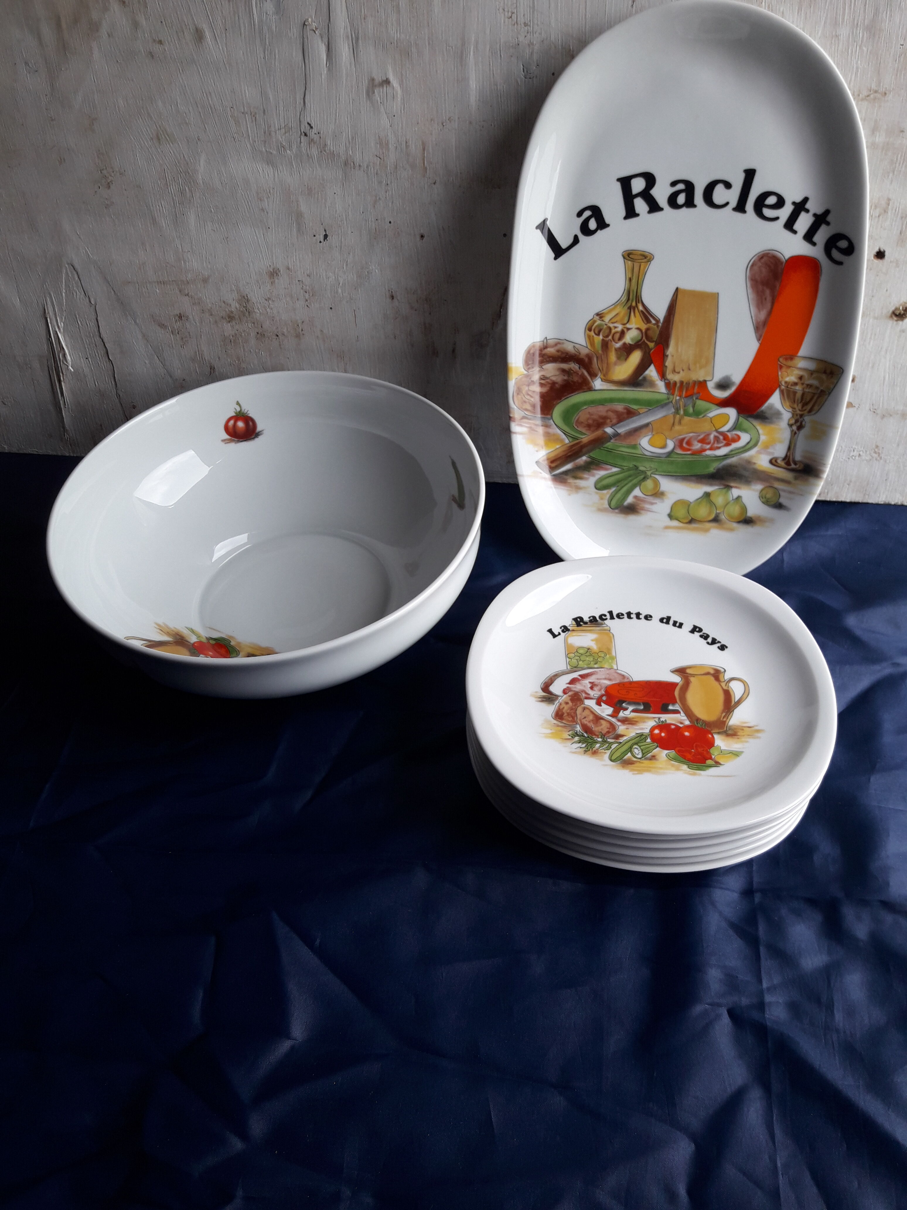Lourioux porcelain raclette service created by Philippe Deshoulières