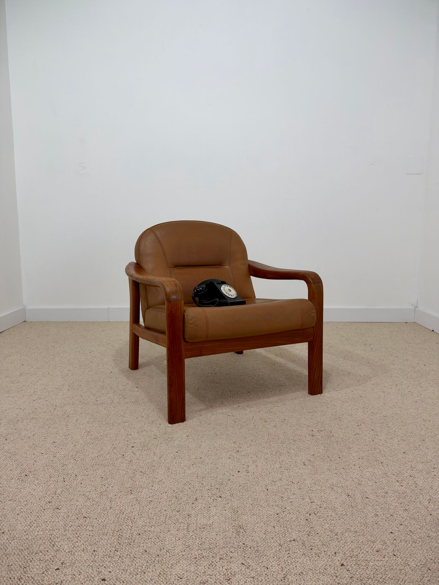 Vintage leather and wood armchair – 1970s