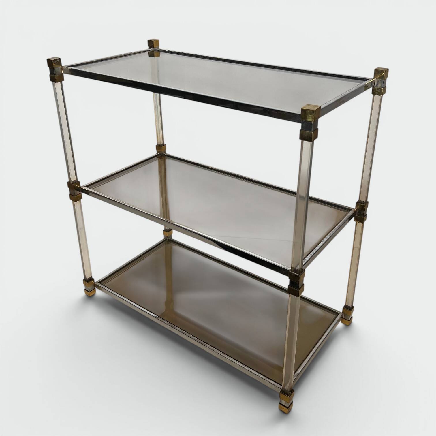 Lucite Shelf with Three Smoked Glass Shelves and Brass Ends. Work