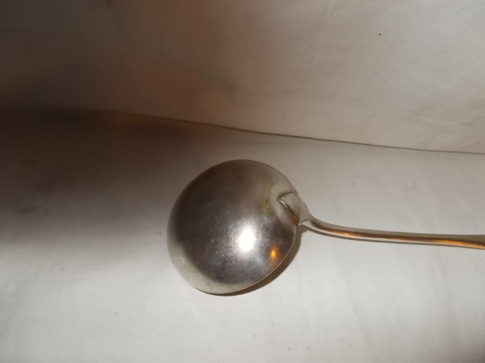 Silver metal ladle