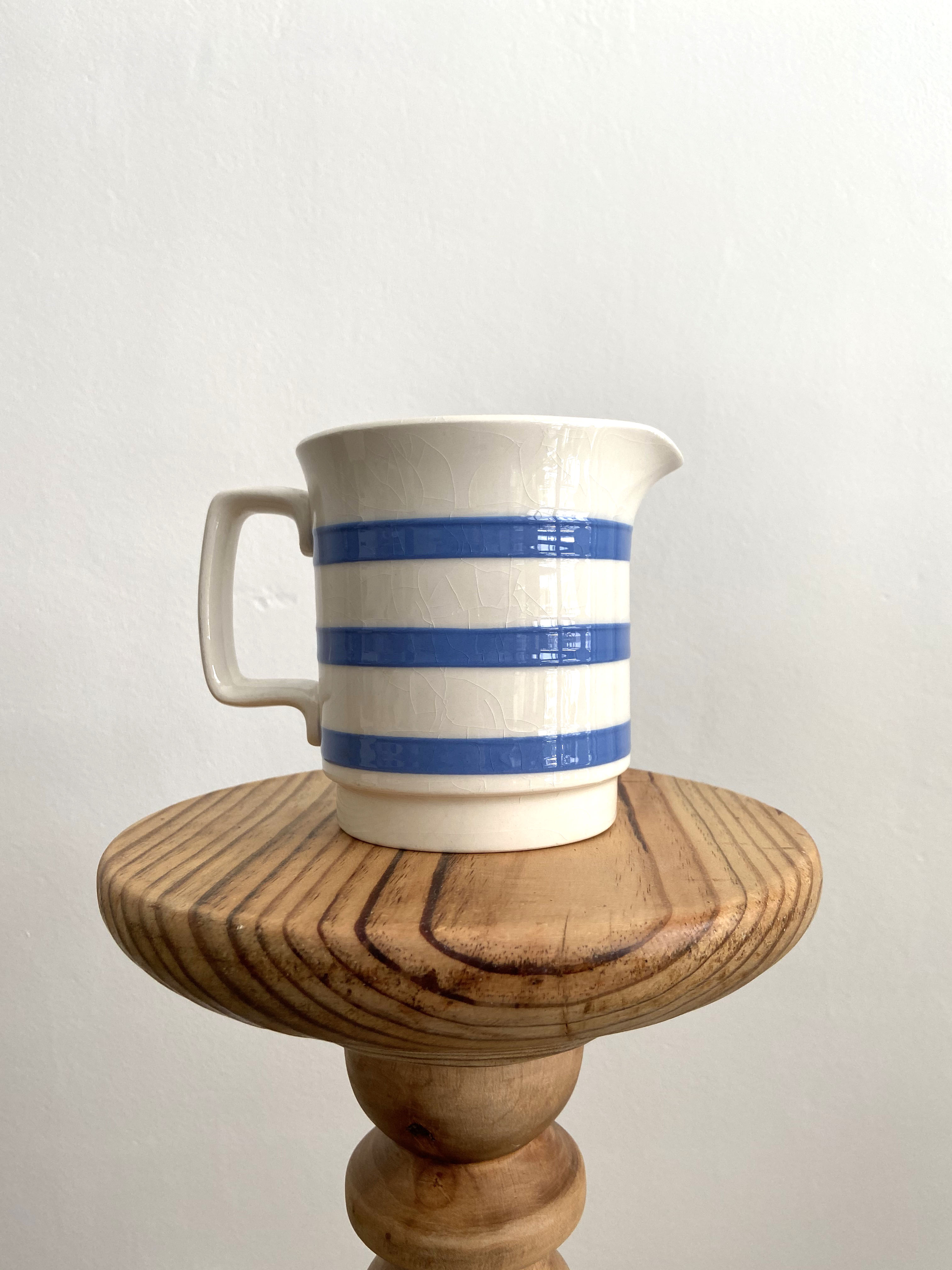 Striped earthenware pitcher