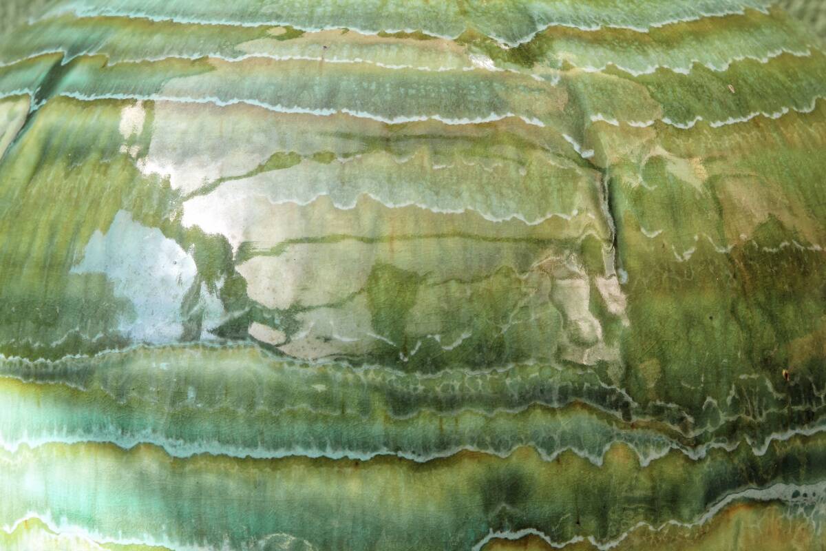 Glazed ceramic ball lamp base, green gradients.