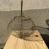 Vintage iron egg basket with hanse antique