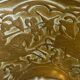 20th century chiseled brass socket candle holder representing Horsemen in armor