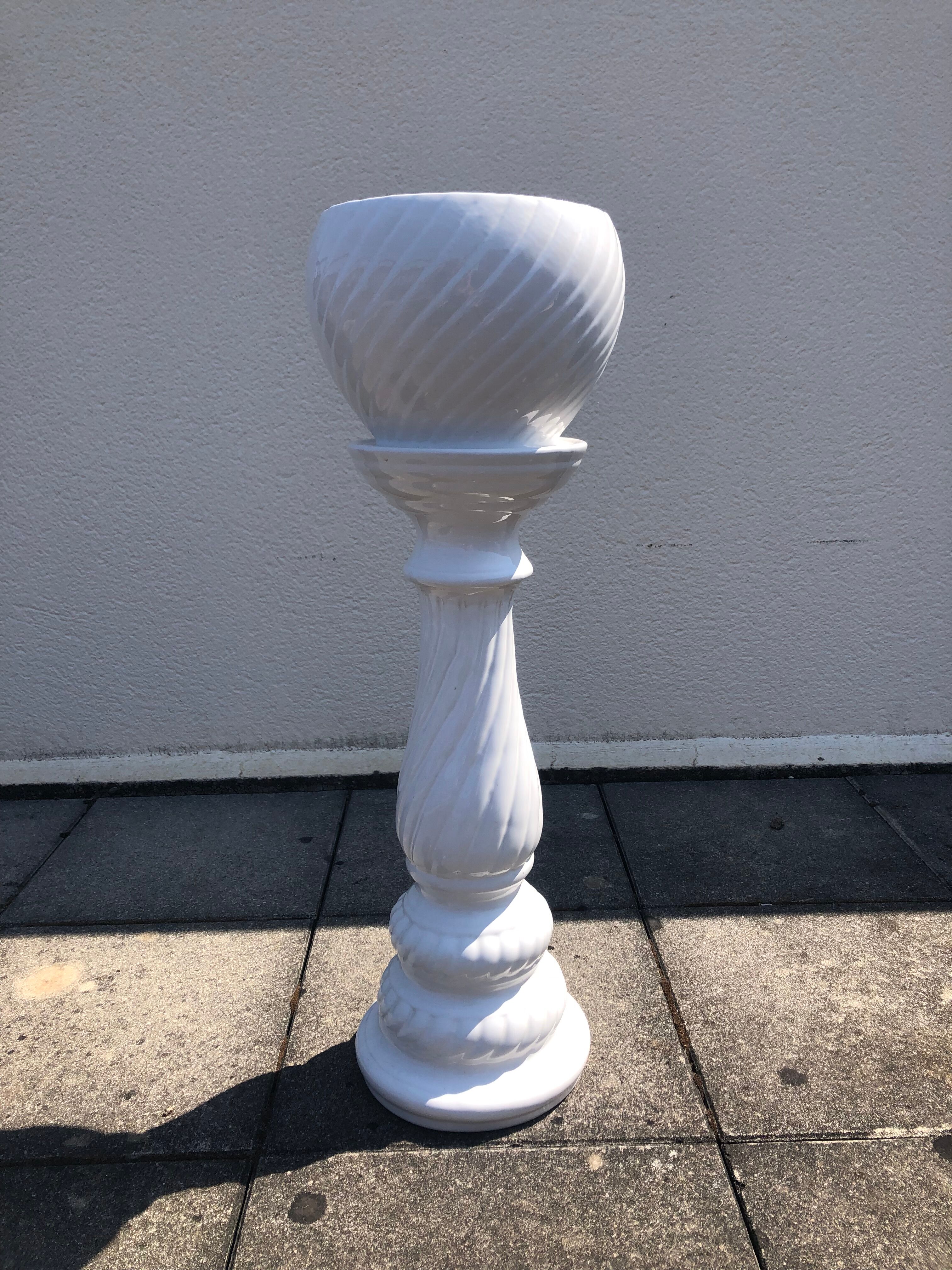 Column and white earthenware pot cover