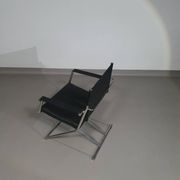 2 chaises pliantes en cuir chromé