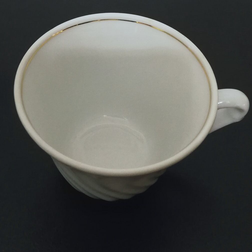 Porcelain coffee service by Philippe Deshoulieres
