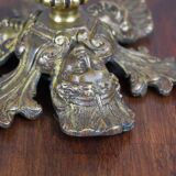 Suspension in bronze and glass paste.
