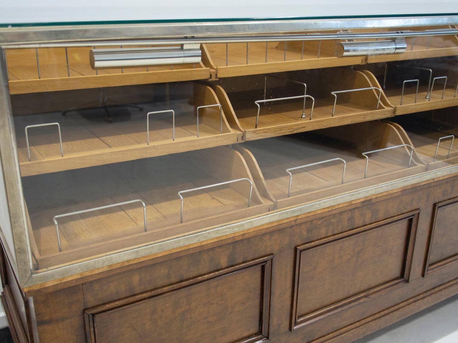 Shop counter made of birch and oak with twenty drawers, 1940s.