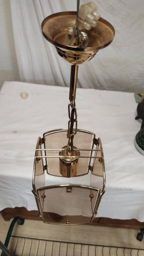 Suspension in gold metal and smoked glass