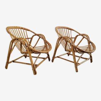 Duo de fauteuils coquille en rotin 1970