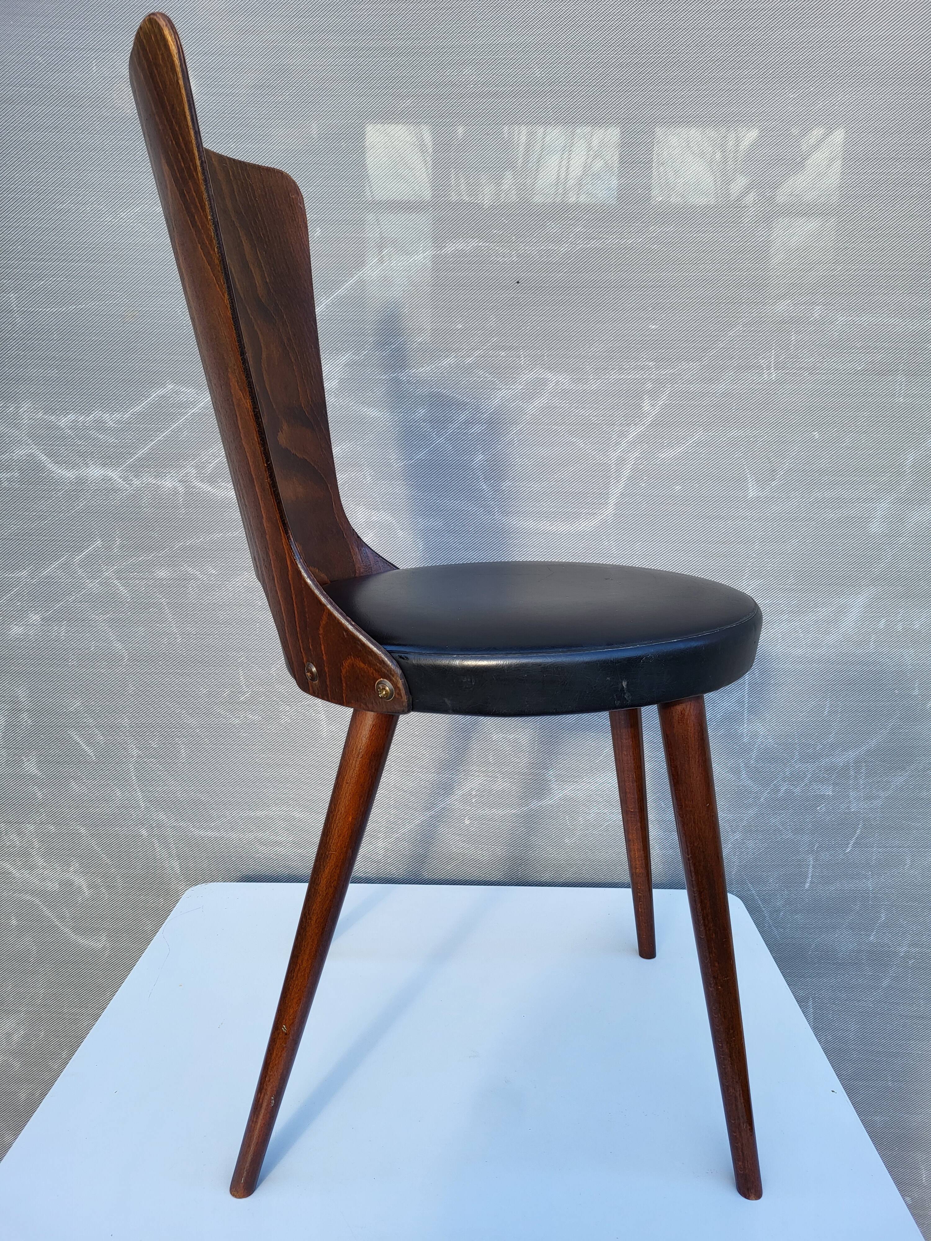 Pair of Dove chairs • Baumann • Black faux leather