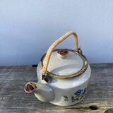 Chinese ceramic and rattan teapot