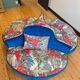 Round conversation sofa – blue velvet & parrot fabric – 140 cm