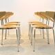 Thonet curved dining chairs stacked in chrome and beech
