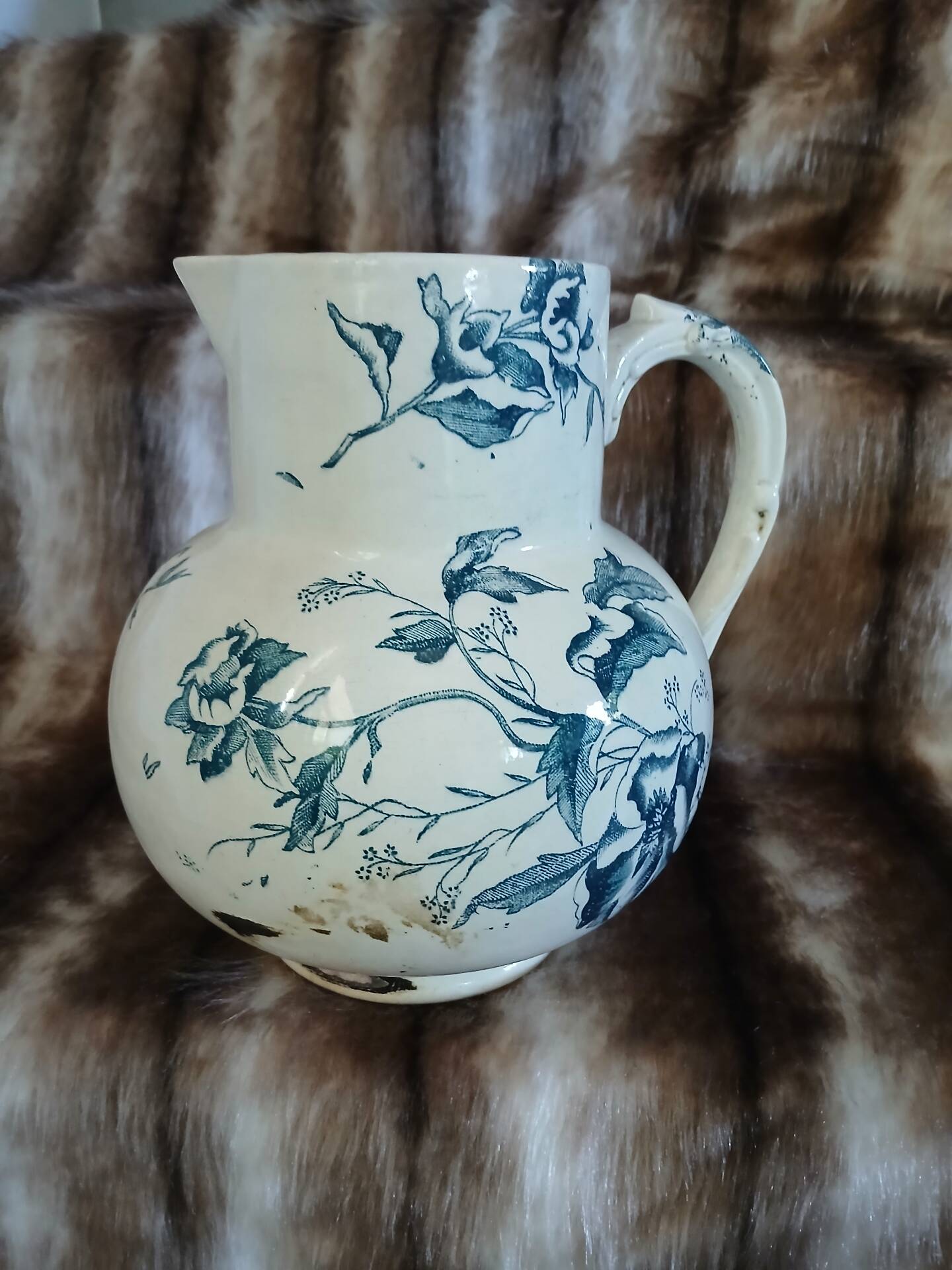 Antique pitcher in ironstone