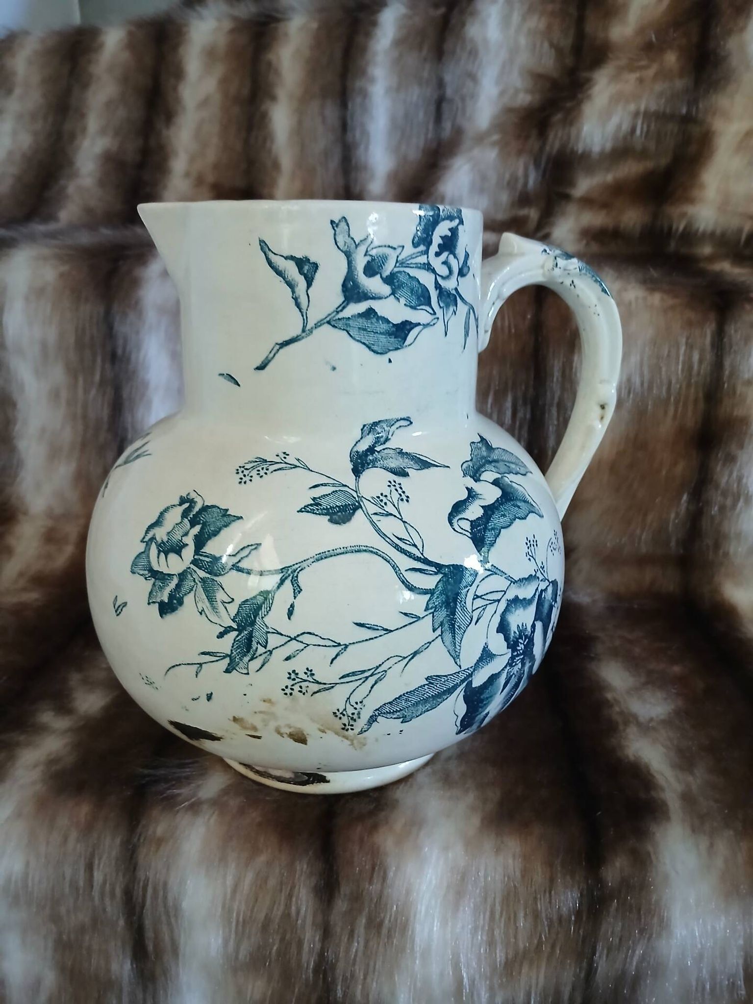 Antique pitcher in ironstone