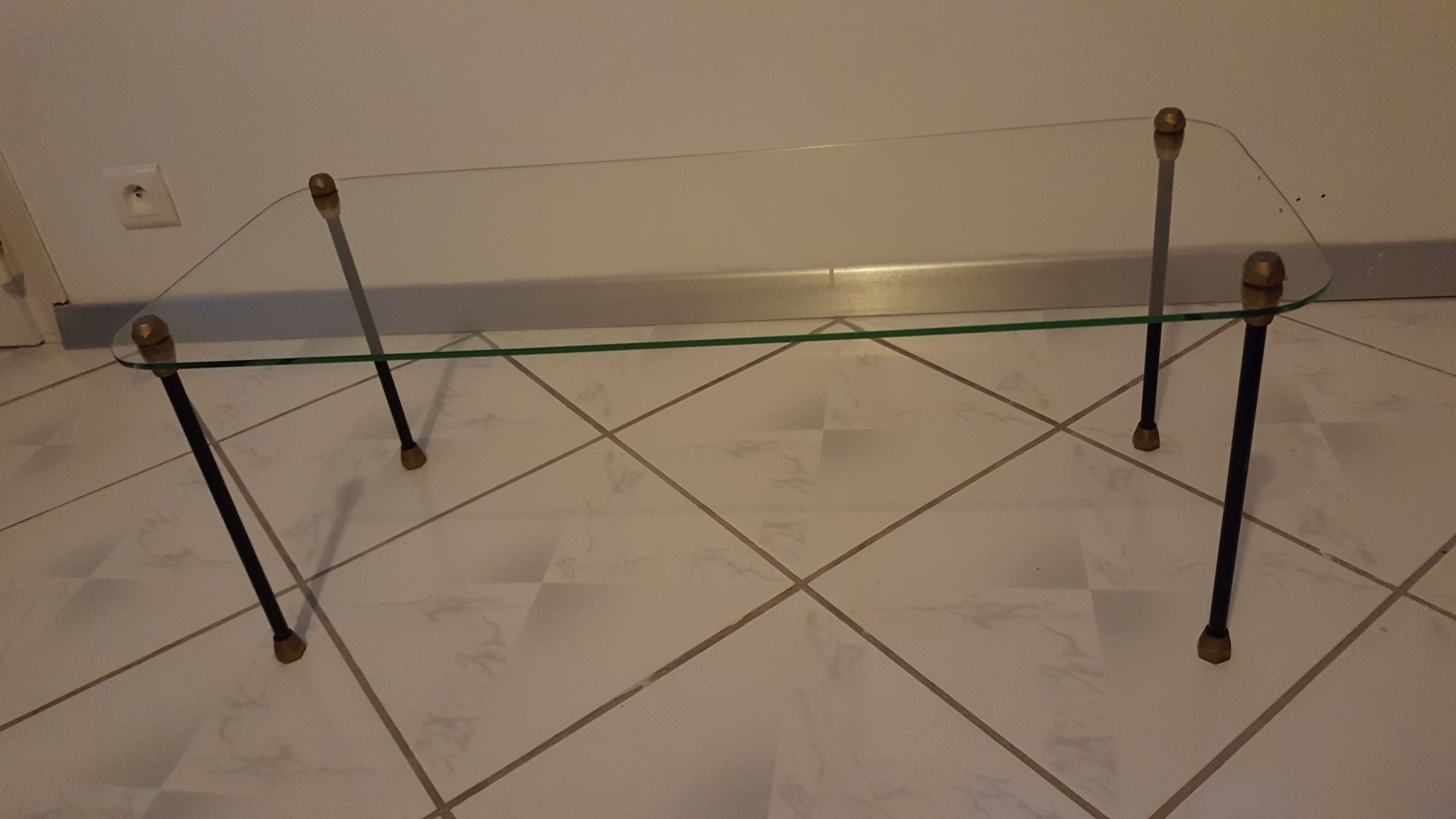 Glass table with brass tip