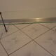 Glass table with brass tip