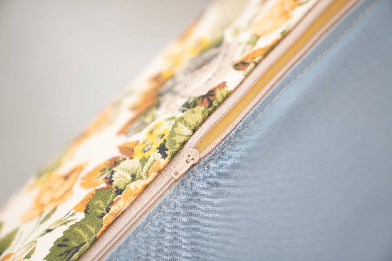 2-seater sofa, floral fabric, wooden structure, plastic and wooden legs, 1970