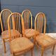 Set of 4 vintage Baumann chairs in honey wood and cane.