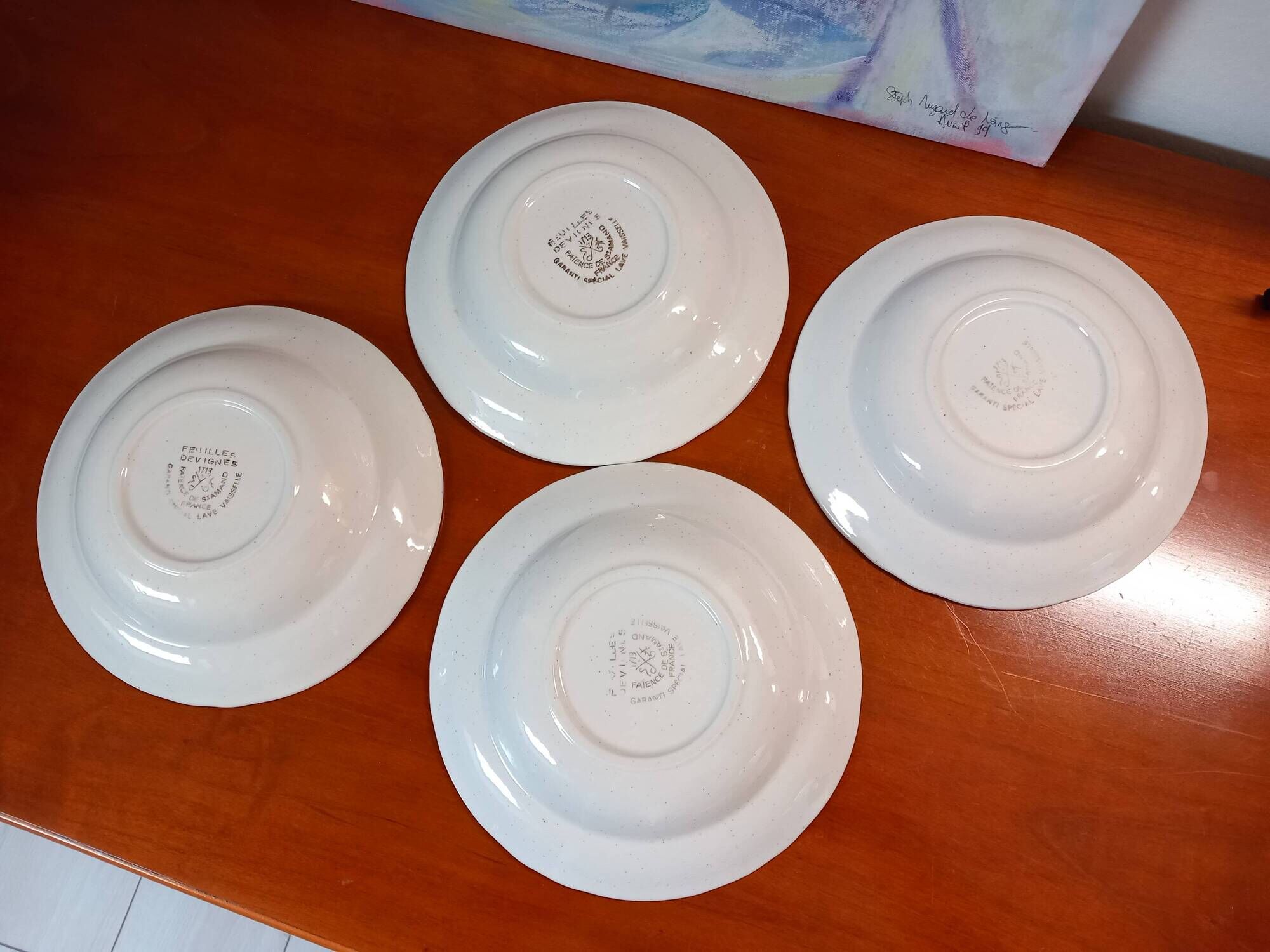 Set of 4 antique deep plates from St Amand in the "Vine Leaves" pattern.
