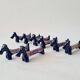Set of 8 vintage ceramic knife rests, retro dog design.