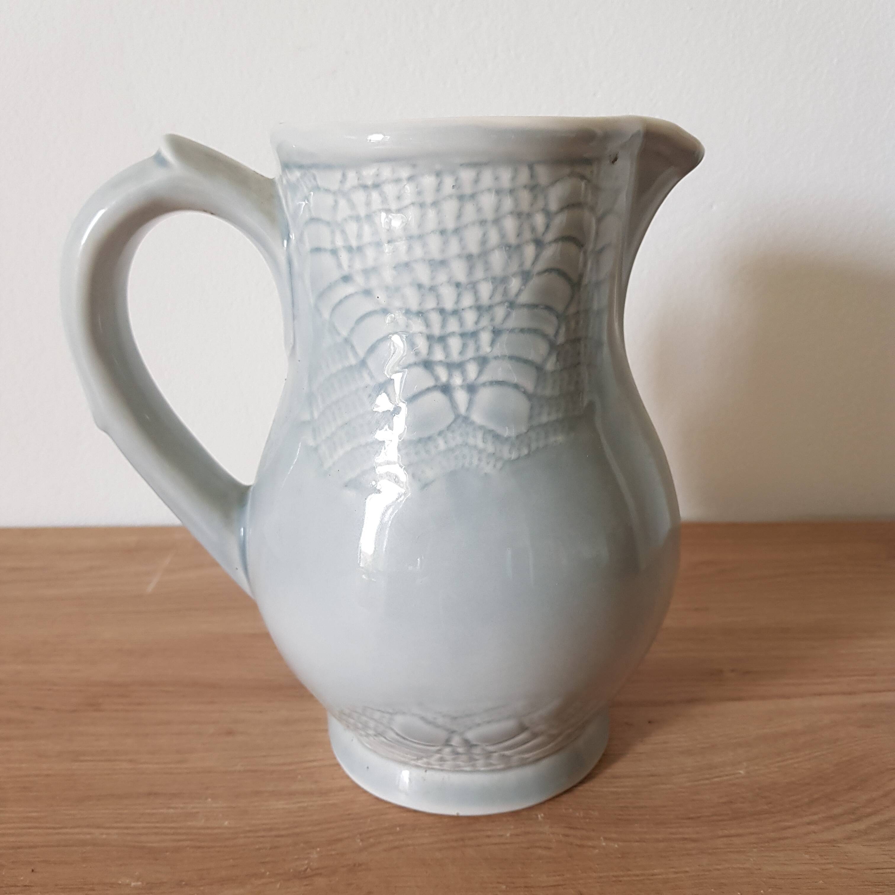 Pastel blue ceramic pitcher