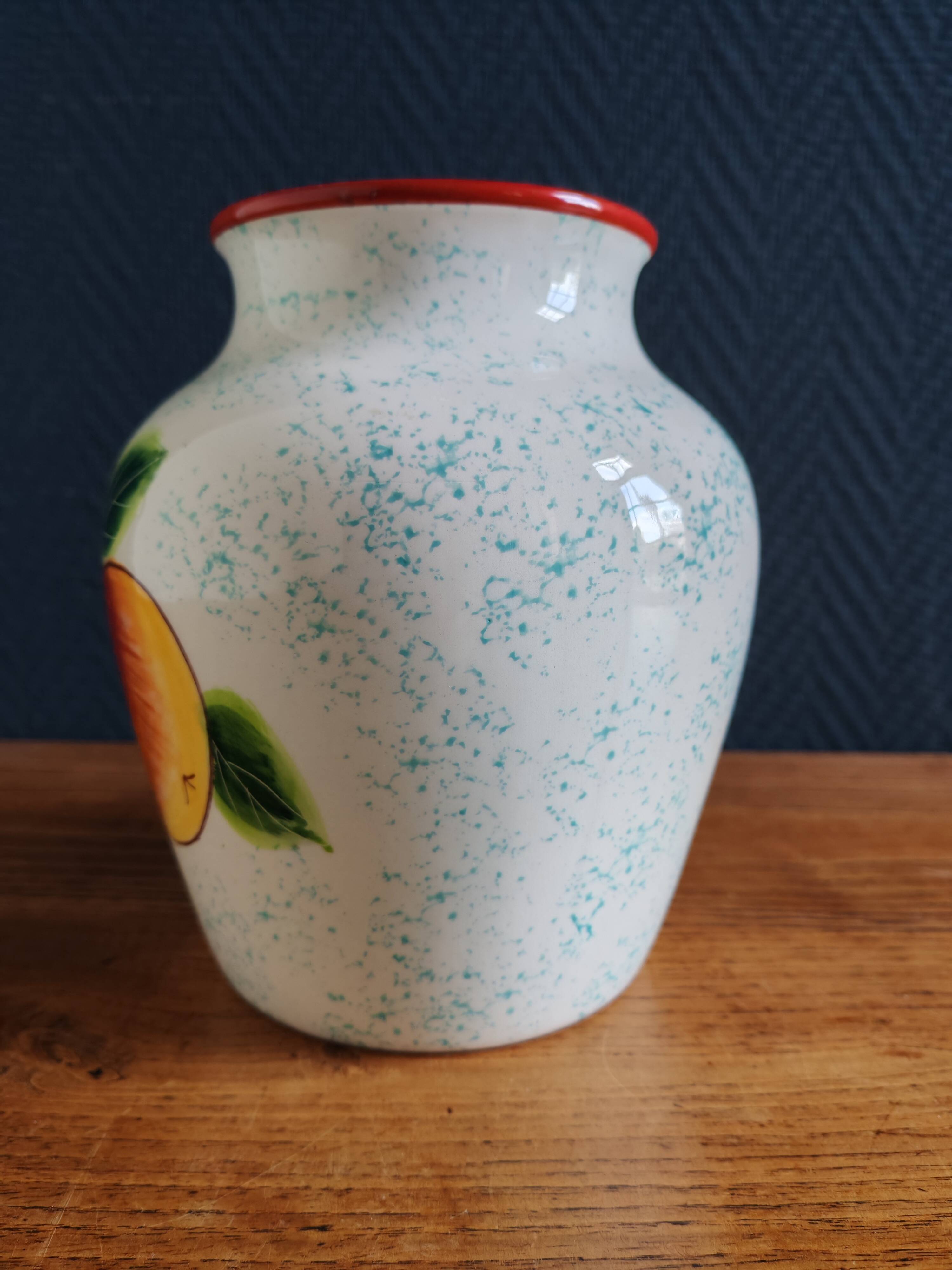 White Ceramic Vase with Peach and Leaf Motifs