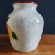 White Ceramic Vase with Peach and Leaf Motifs