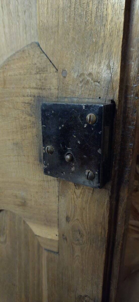 Louis XV period wardrobe façade, solid wood architectural elements, richly carved.