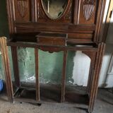 Very decorative coat rack with bevelled mirror.