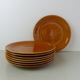 Set of 8 ocher enameled ceramic dinner plates