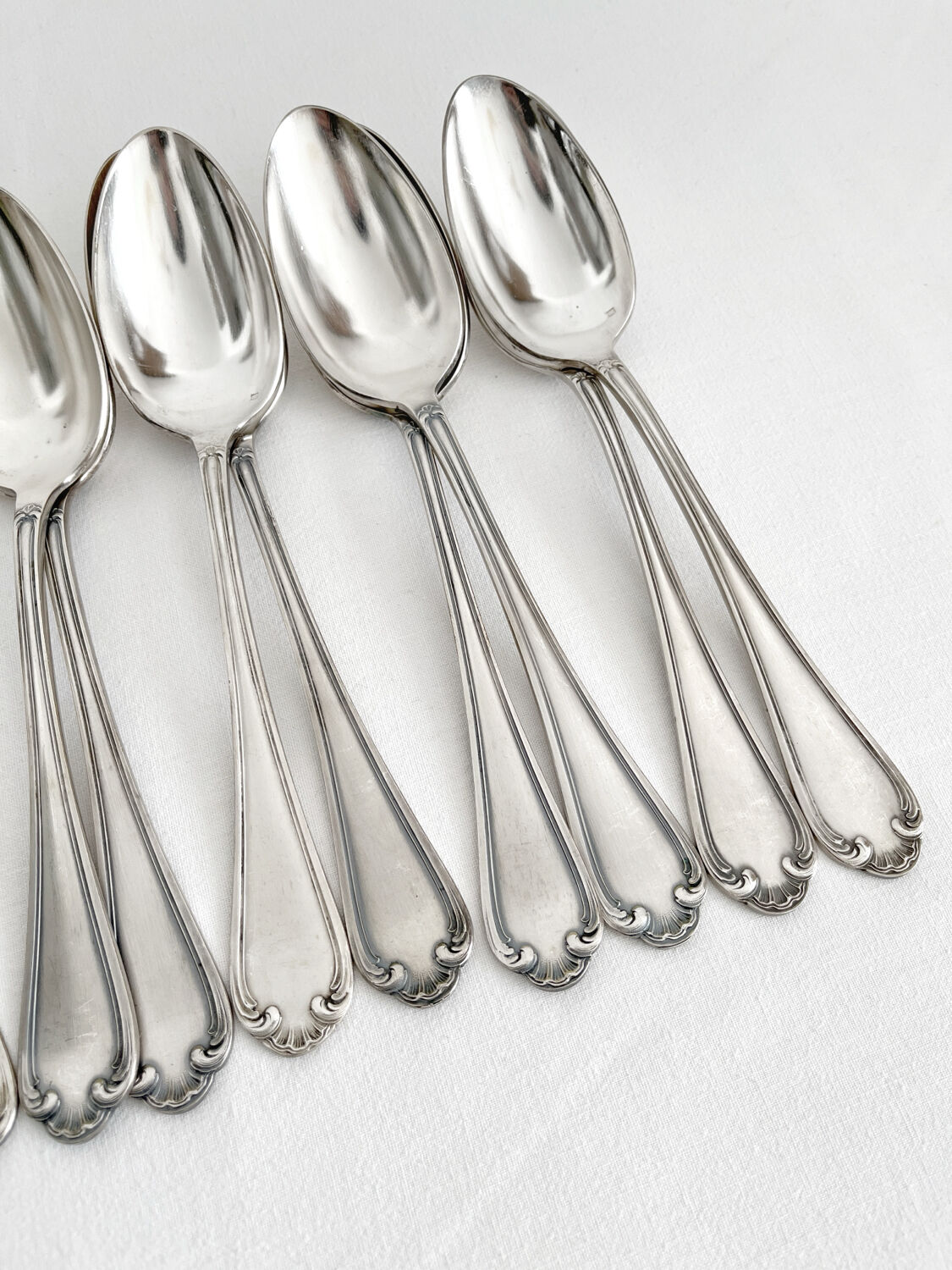 12 antique silver plated shell soup spoons