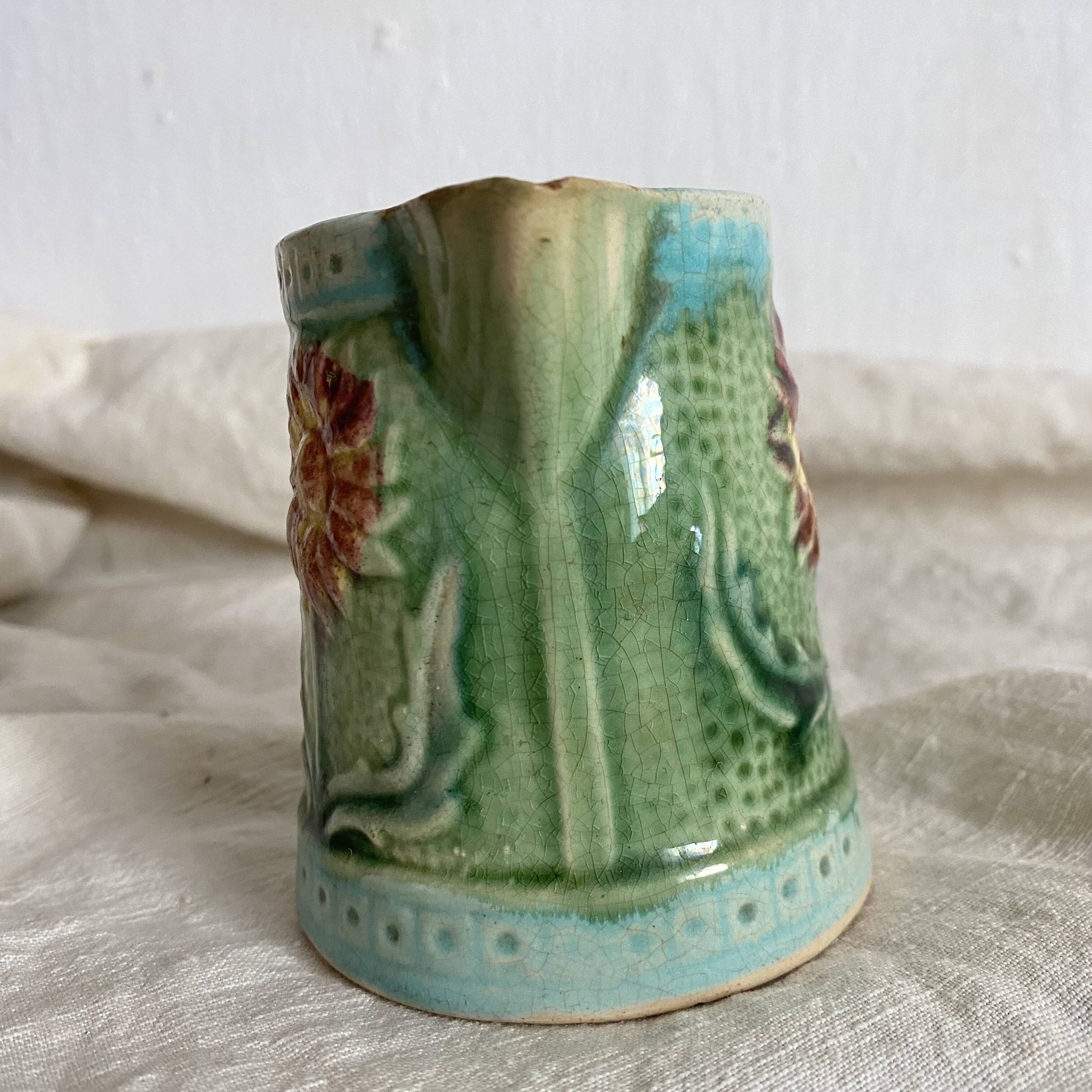 Small Art Nouveau slip milk pitcher