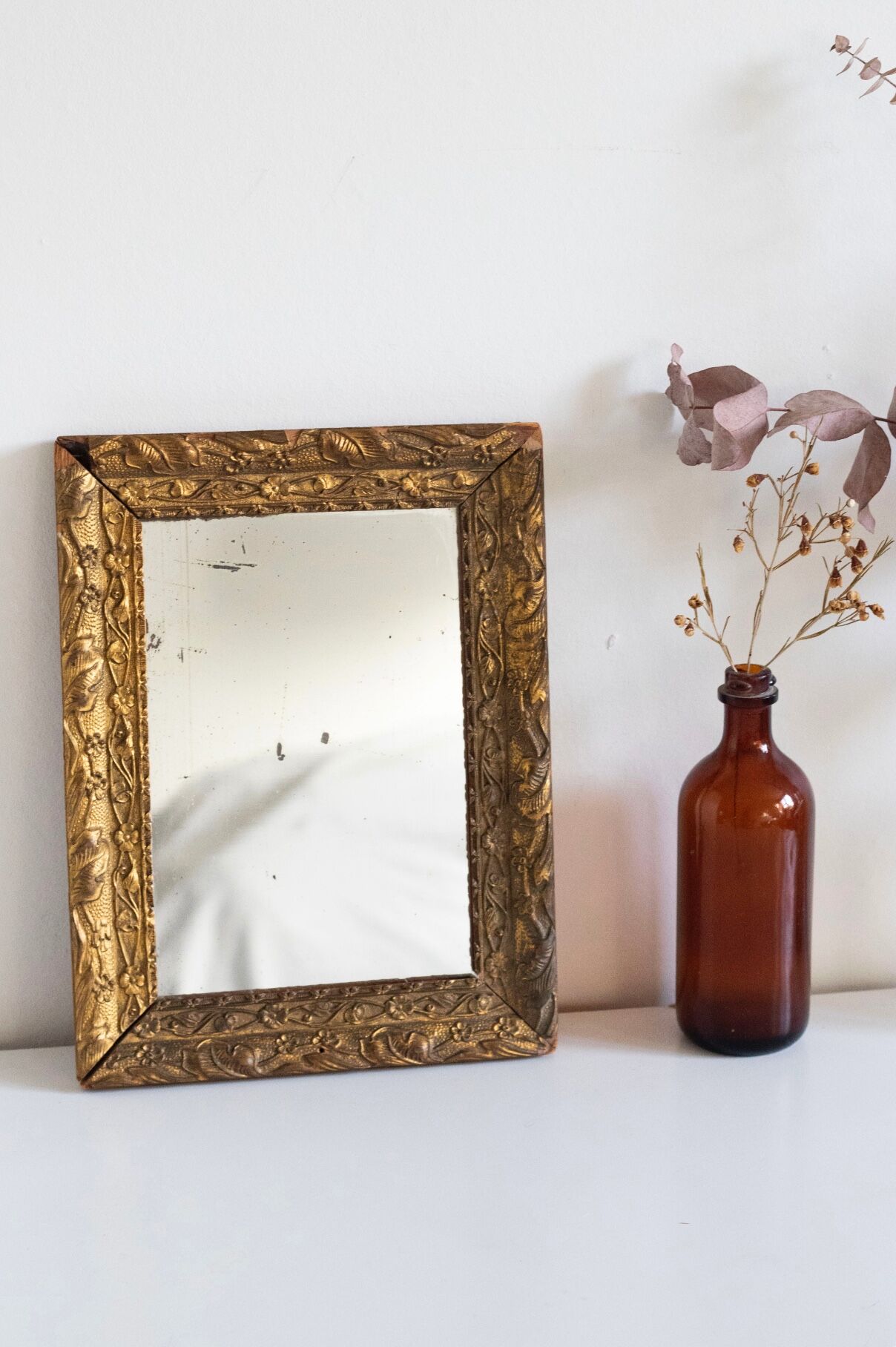 Antique mirror in gilded wood