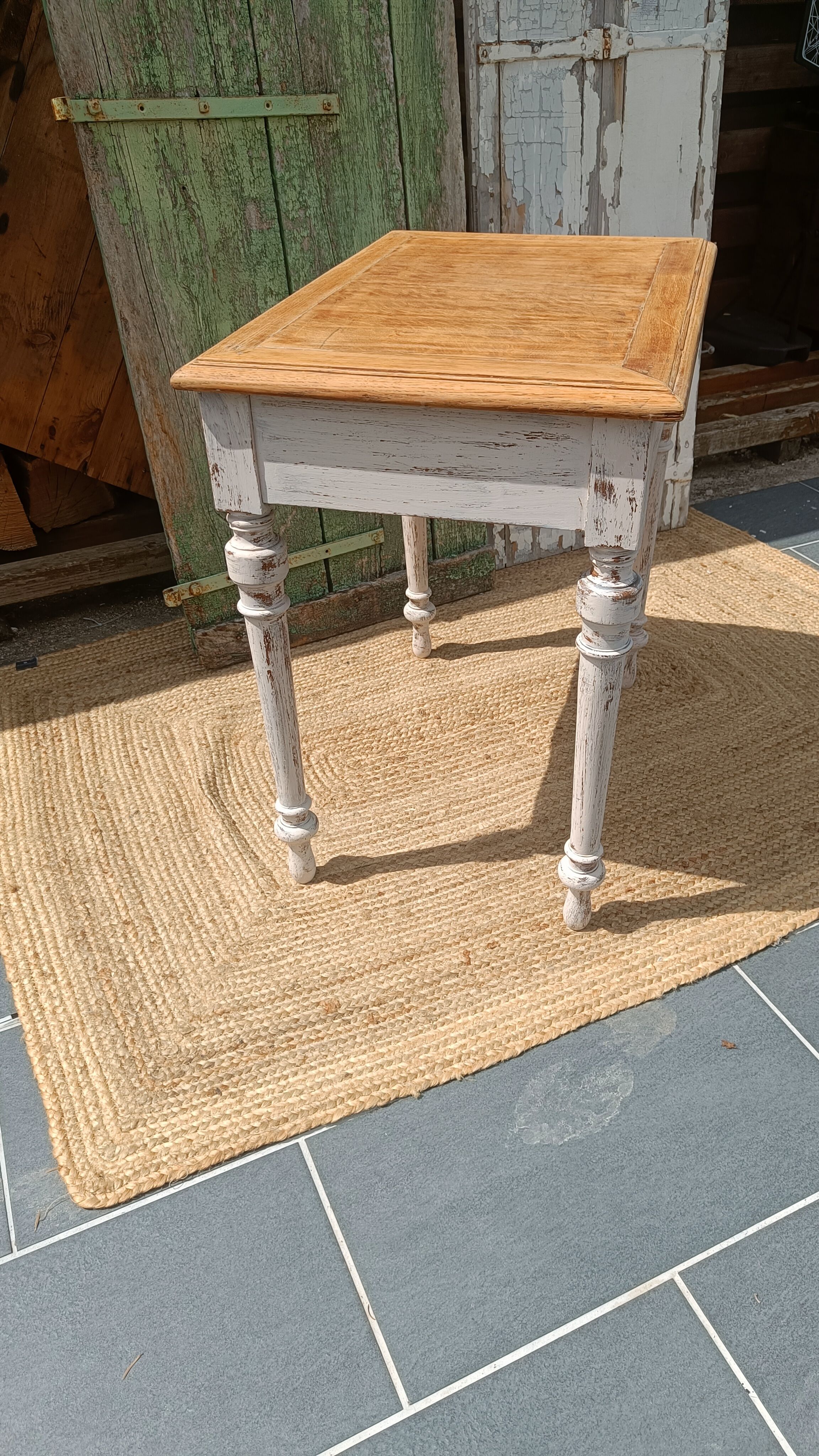 Antique drawer table with a patina.