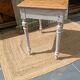 Antique drawer table with a patina.