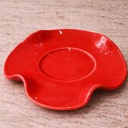Set of wavy ceramic cup and saucer - poppy red